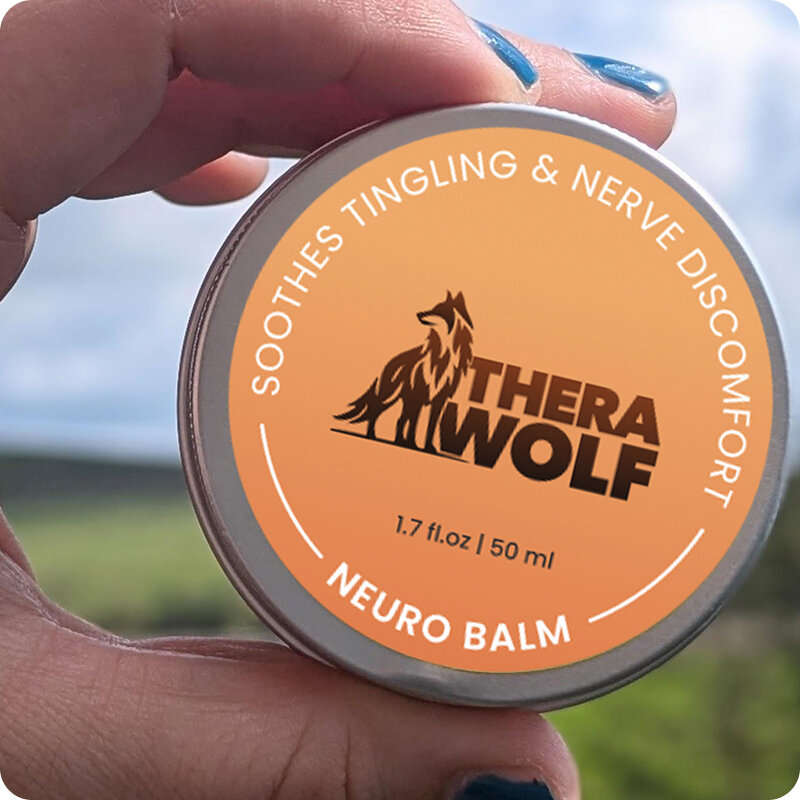 Person massaging knee with natural pain relief balm — TheraWolf